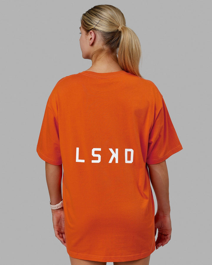 Woman wearing Unisex Endeavour Heavyweight Tee Oversize - Impact Orange