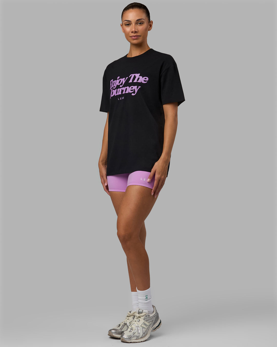 Woman wearing Unisex Enjoy The Journey FLXCotton Tee Oversize - Black-Light Violet