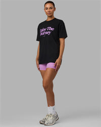 Woman wearing Unisex Enjoy The Journey FLXCotton Tee Oversize - Black-Light Violet