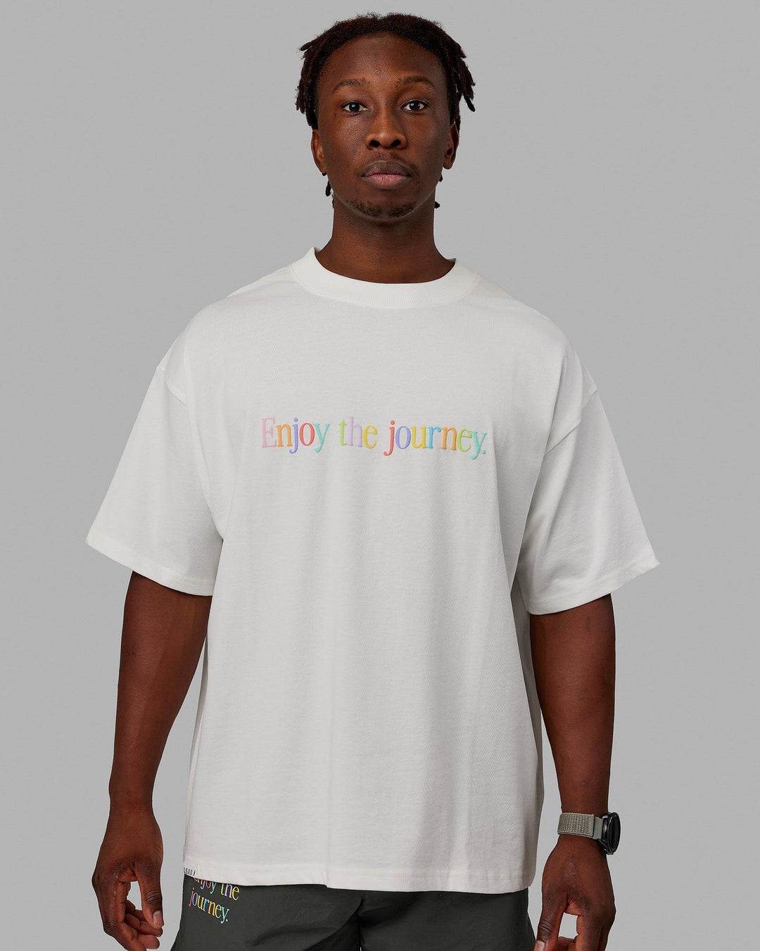 Man wearing Unisex Enjoy The Journey Heavyweight Tee Oversize - Off White-Multi