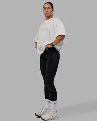 Woman wearing Unisex Enjoy The Journey Heavyweight Tee Oversize - Off White-Multi