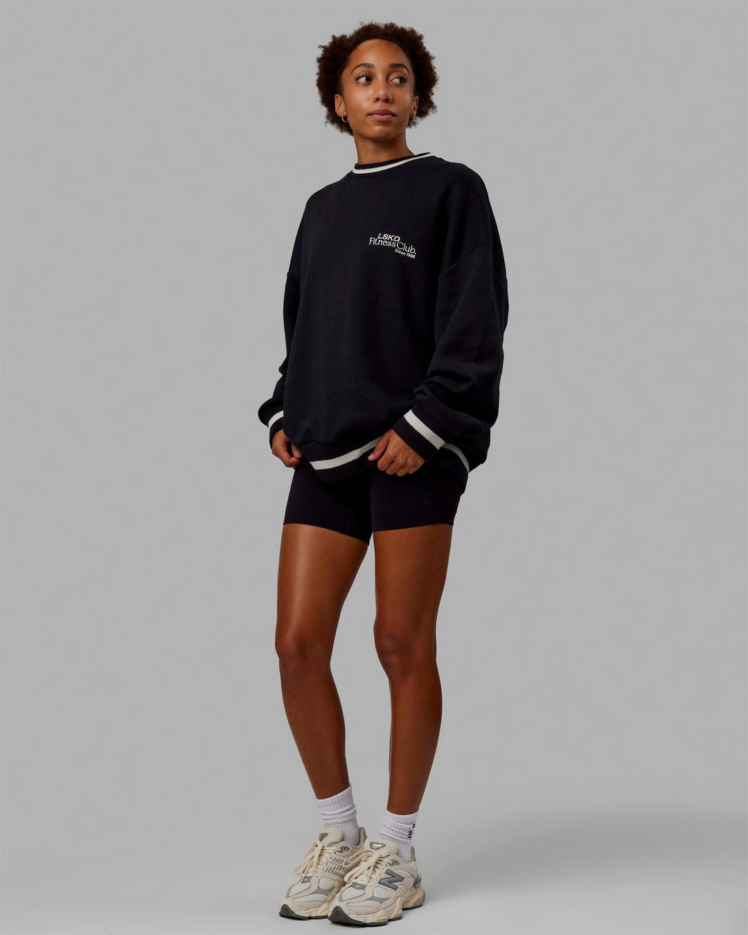 Woman wearing Unisex Fitness Club Sweater Oversize - Black-Off White