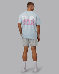 Man wearing Unisex Gone Running FLXCotton Tee Oversize - Skyride-Bubblegum | Thumbnail Index: 11