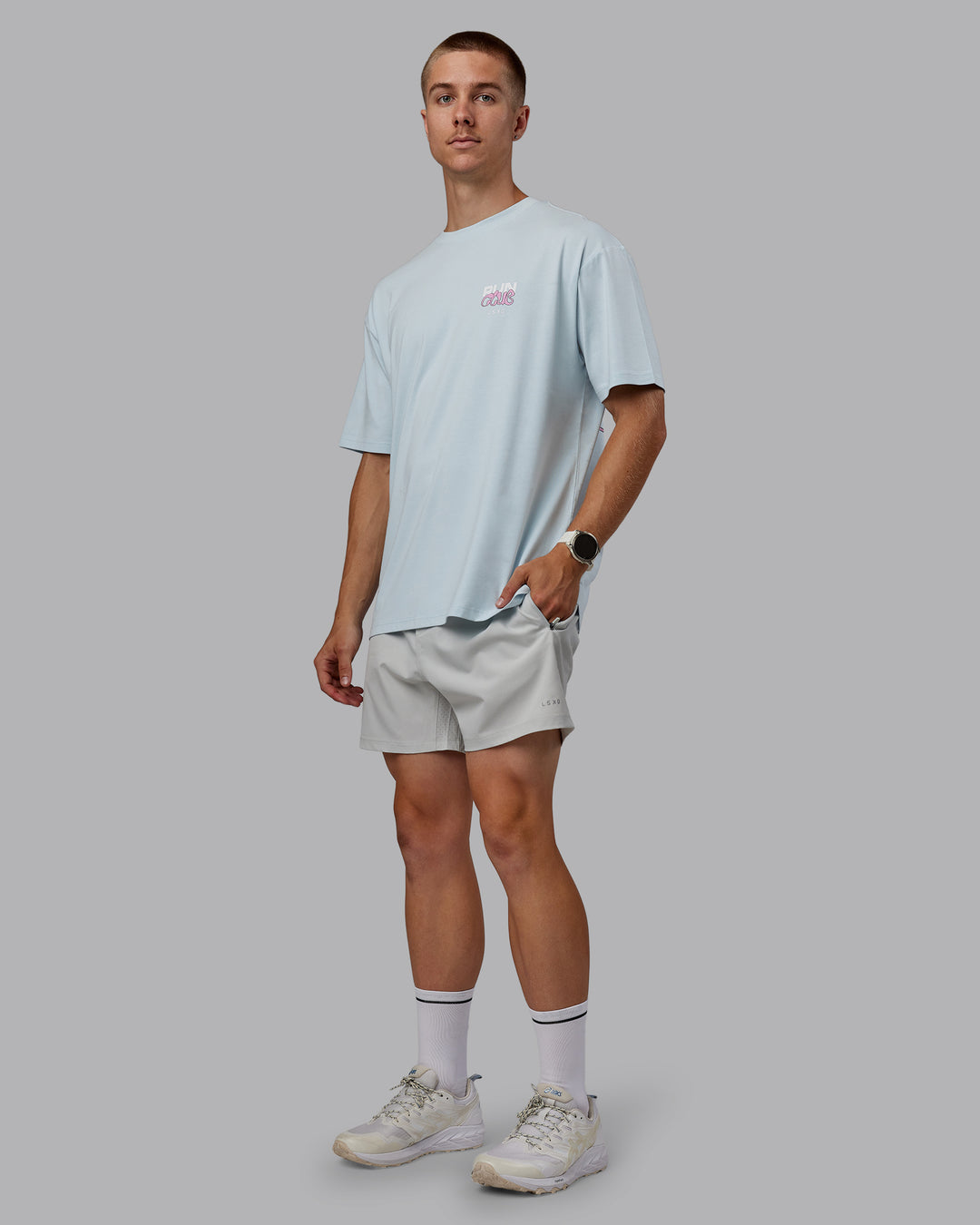 Man wearing Unisex Gone Running FLXCotton Tee Oversize - Skyride-Bubblegum - view 10