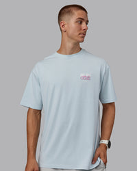 Man wearing Unisex Gone Running FLXCotton Tee Oversize - Skyride-Bubblegum | Thumbnail Index: 2