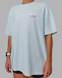 Woman wearing Unisex Gone Running FLXCotton Tee Oversize - Skyride-Bubblegum | Thumbnail Index: 6