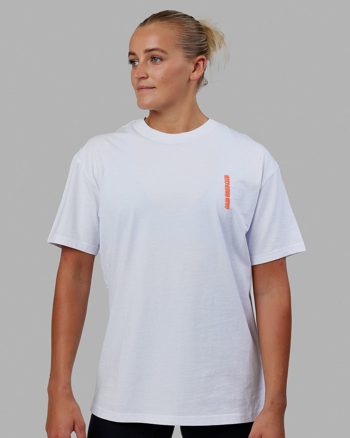 Woman wearing Unisex Good Times Global Heavyweight Tee Oversize - White-Red-Purple