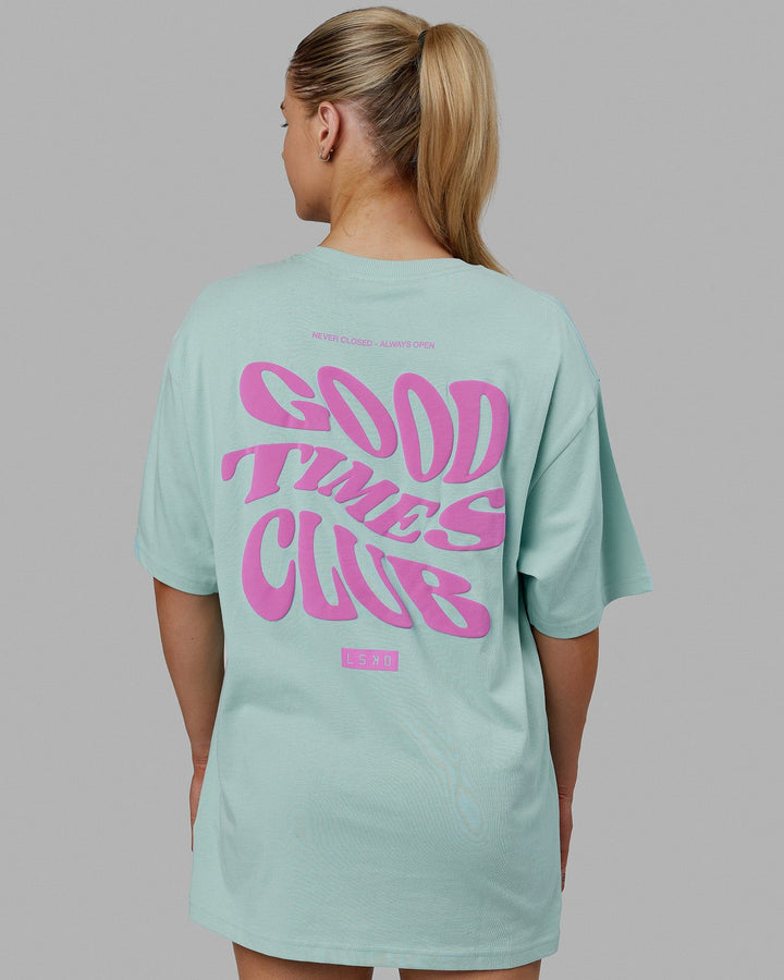 Woman wearing Unisex Good Times Heavyweight Tee Oversize - Pastel Turquoise-Spark Pink