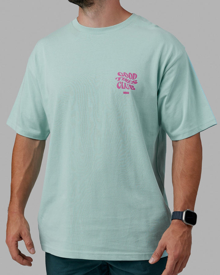 Man wearing Unisex Good Times Heavyweight Tee Oversize - Pastel Turquoise-Spark Pink