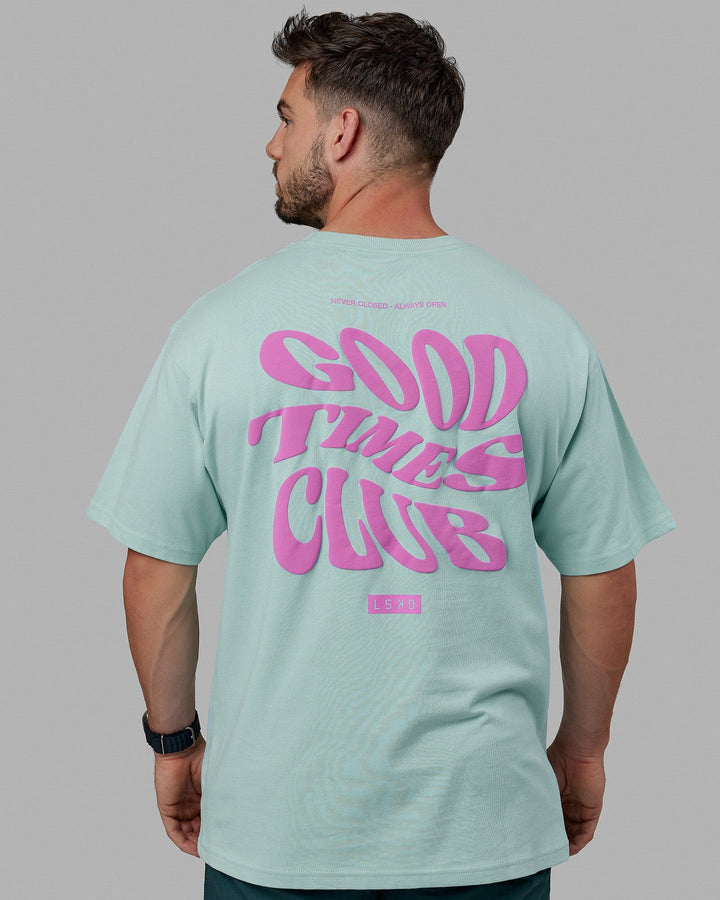Man wearing Unisex Good Times Heavyweight Tee Oversize - Pastel Turquoise-Spark Pink