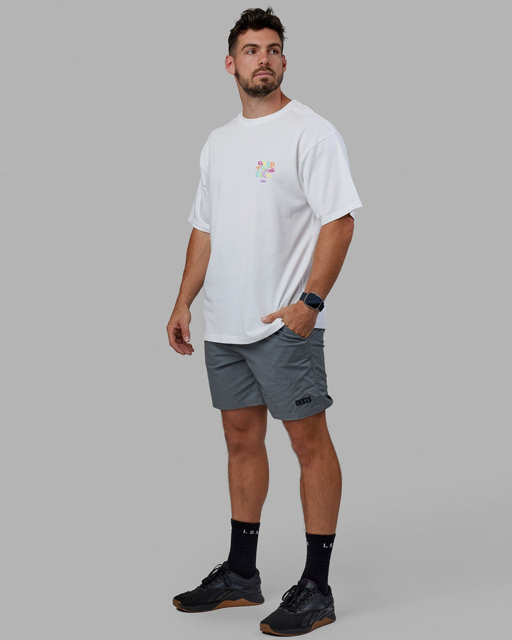 Man wearing Unisex Good Times Heavyweight Tee Oversize - White-Multi