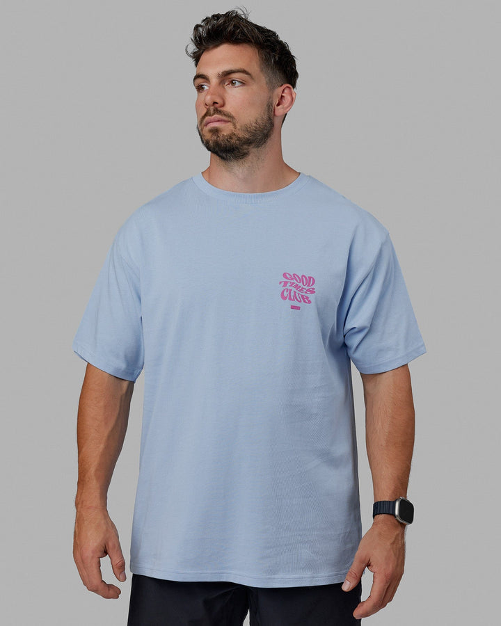 Man wearing Unisex Good Times Heavyweight Tee Oversize - Windsurfer-Spark Pink