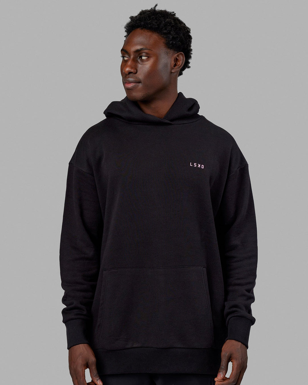Man wearing Unisex Lift-Up Hoodie Oversize - Black