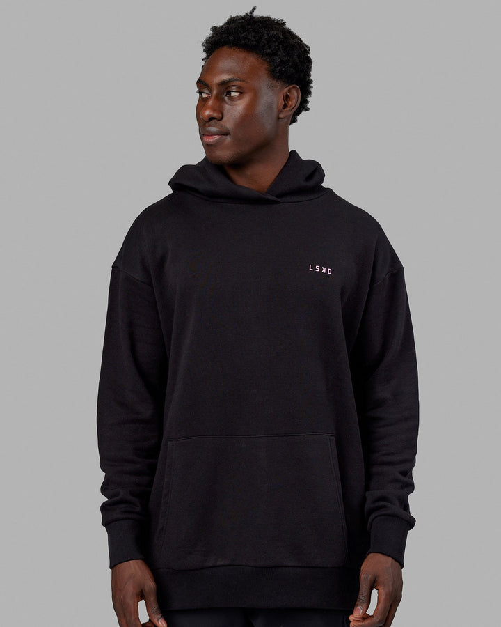 Man wearing Unisex Lift-Up Hoodie Oversize - Black