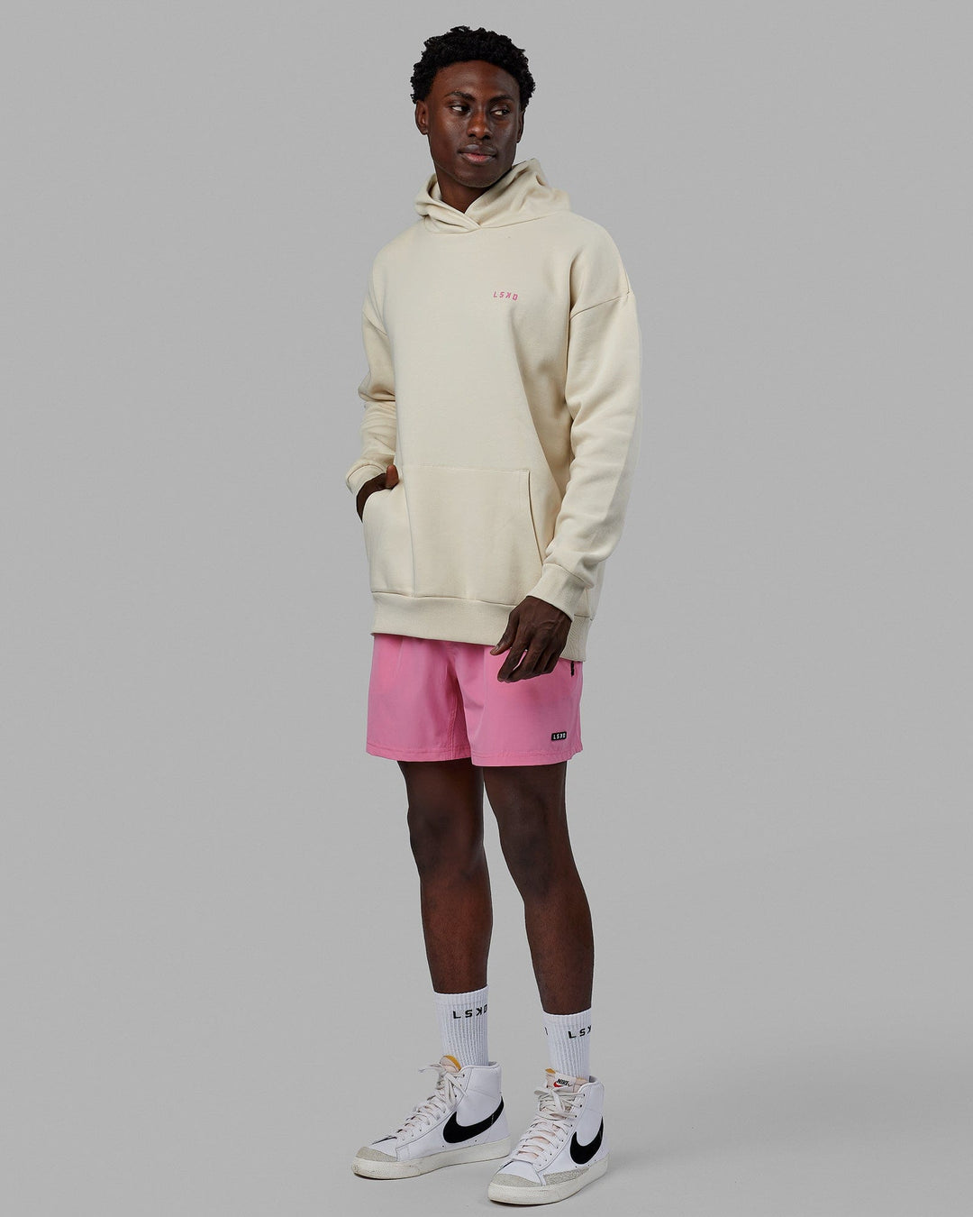 Man wearing Unisex Lift-Up Hoodie Oversize - Warm White