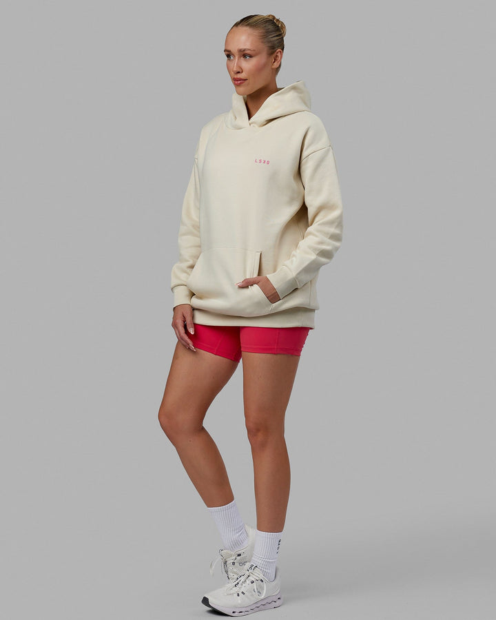 Woman wearing Unisex Lift-Up Hoodie Oversize - Warm White