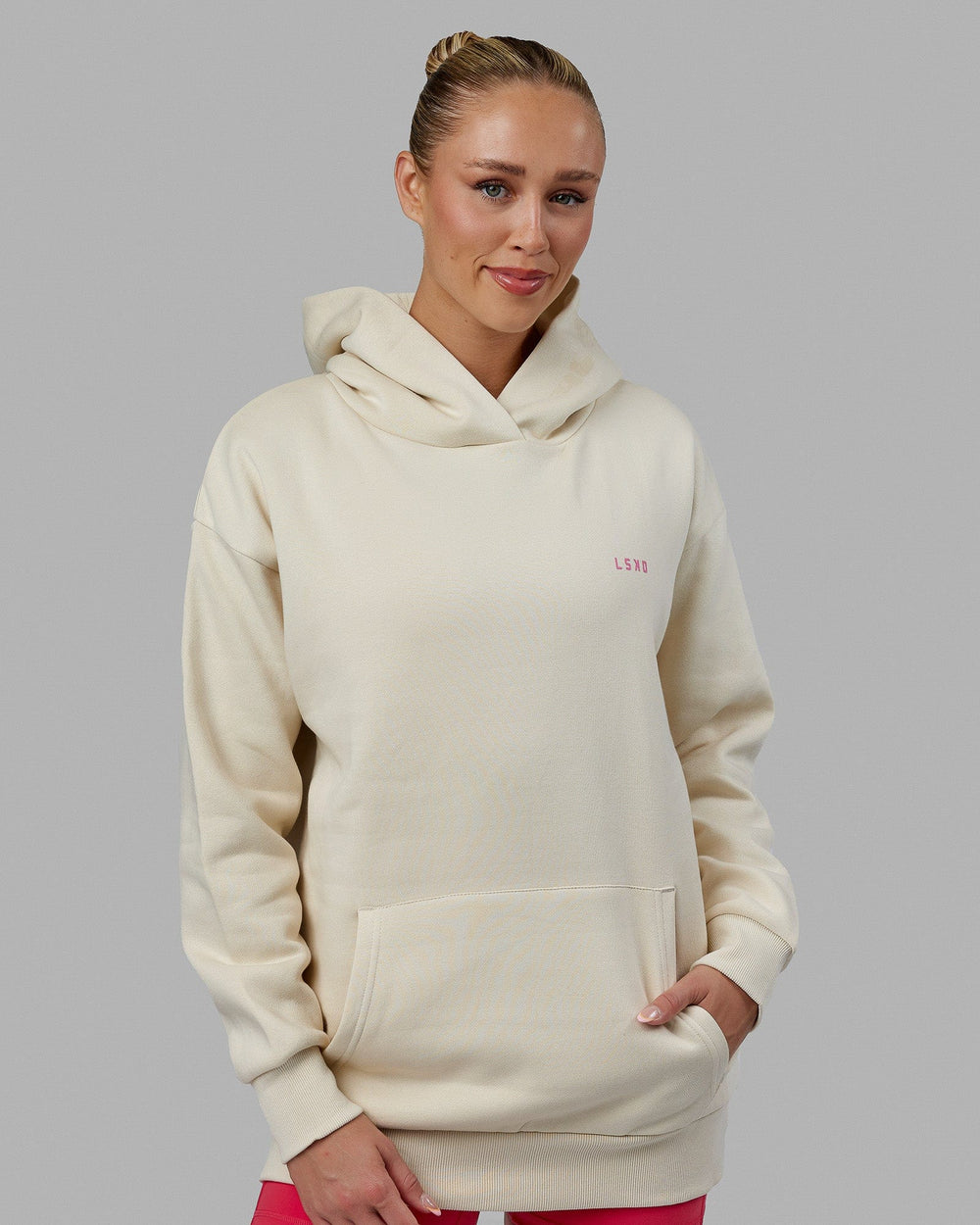 Woman wearing Unisex Lift-Up Hoodie Oversize - Warm White