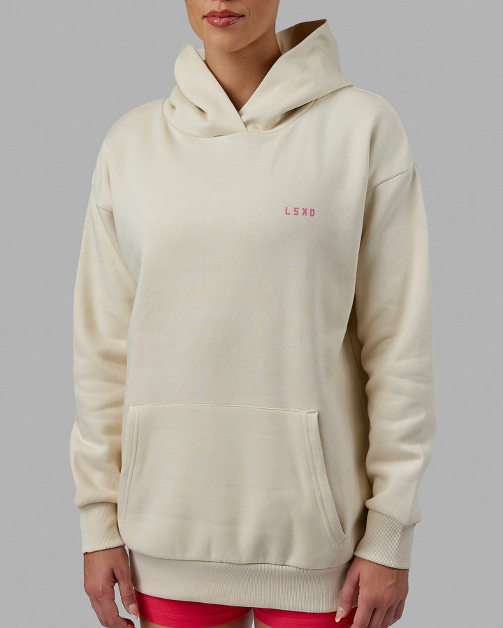 Woman wearing Unisex Lift-Up Hoodie Oversize - Warm White