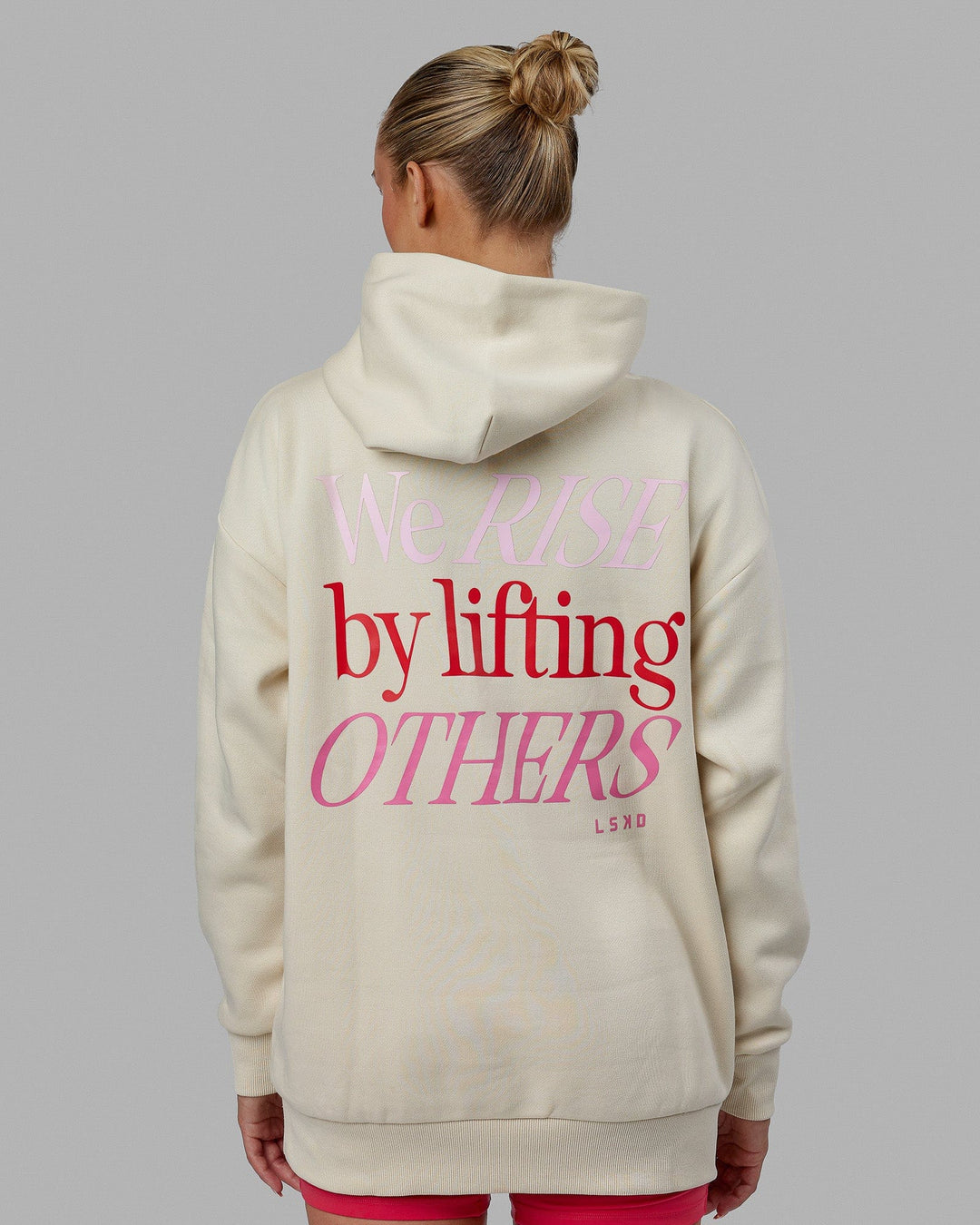 Woman wearing Unisex Lift-Up Hoodie Oversize - Warm White