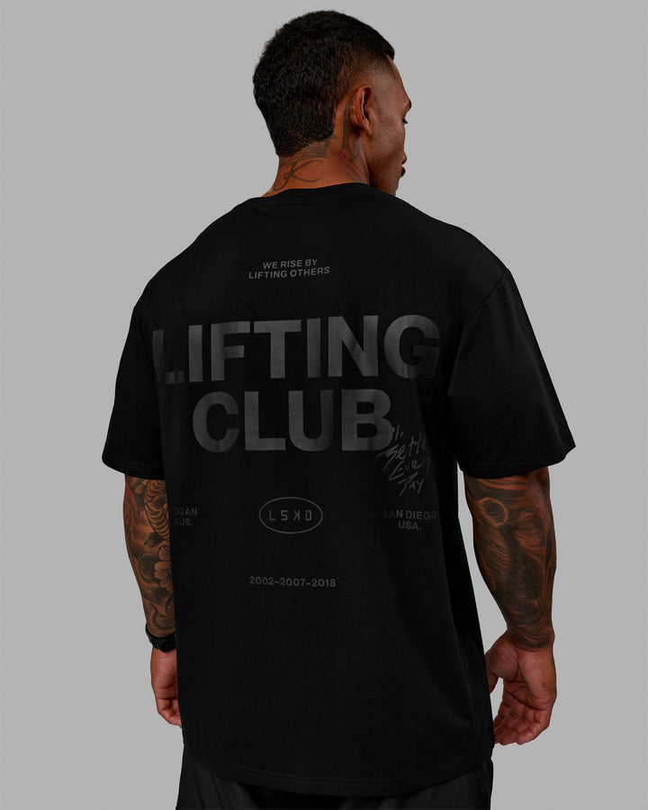 Man wearing Unisex Lifting Club FLXCotton Tee Oversize - Black-Black