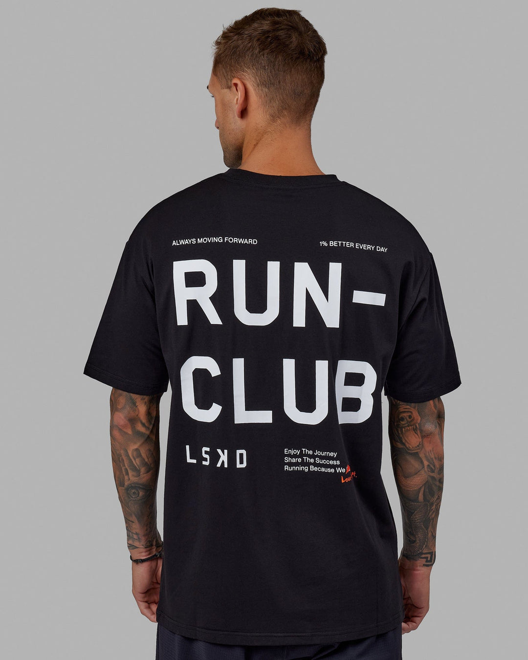 Man wearing Unisex Love The Run FLXCotton Tee Oversize - Black-White