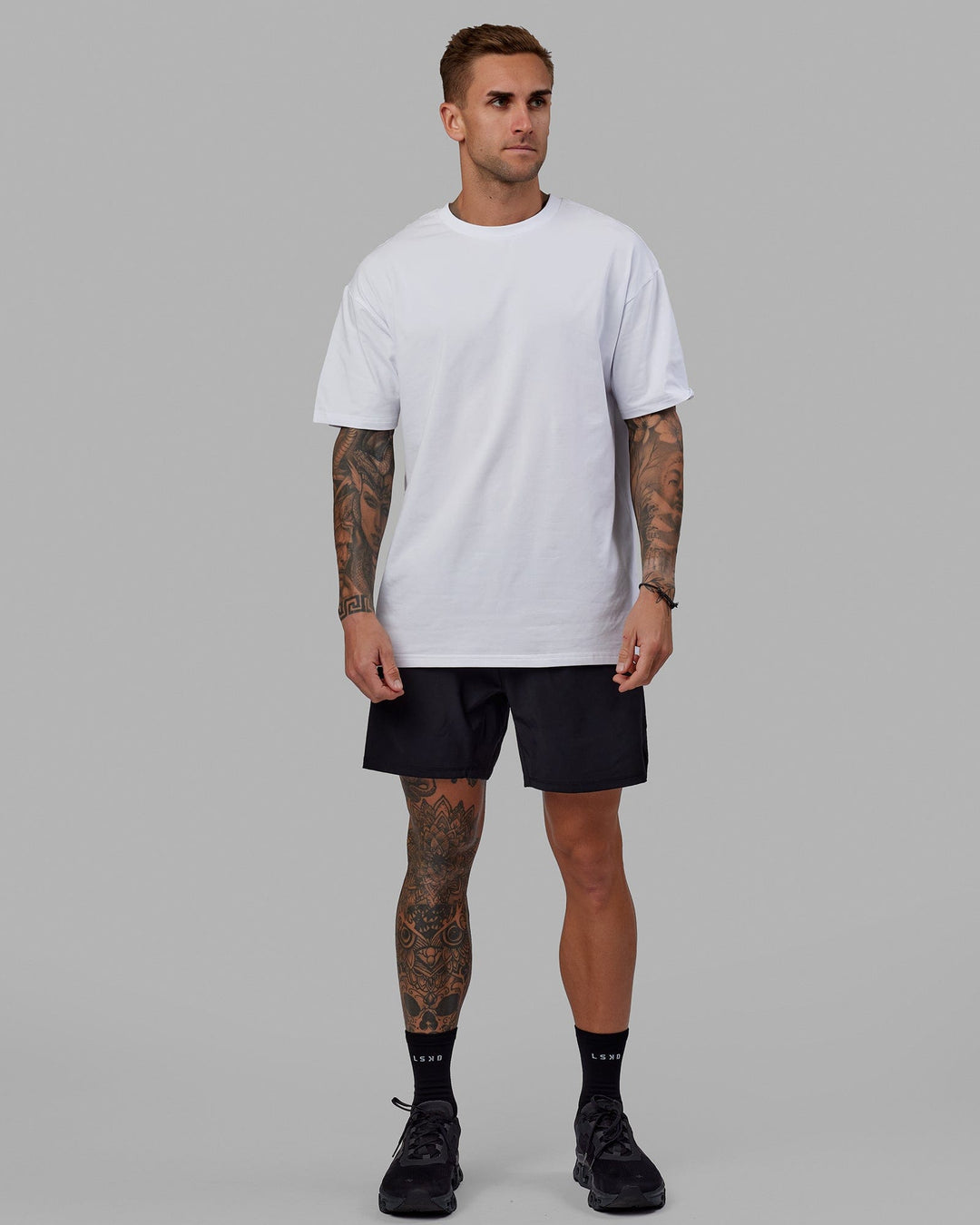 Man wearing Unisex Love The Run FLXCotton Tee Oversize - White-Black