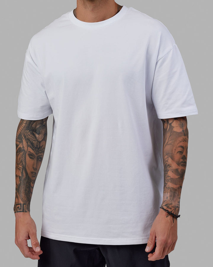 Man wearing Unisex Love The Run FLXCotton Tee Oversize - White-Black