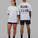Duo wearing Unisex Love The Run FLXCotton Tee Oversize - White-Black