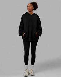Woman wearing Unisex Love The Run Hoodie Oversize - Black-White