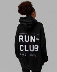 Woman wearing Unisex Love The Run Hoodie Oversize - Black-White