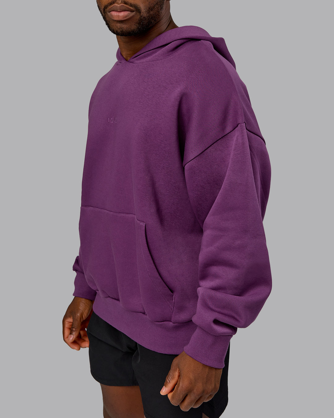 Man wearing MVP Oversized Hoodie - Deep Purple | Model:Sam | Size:L