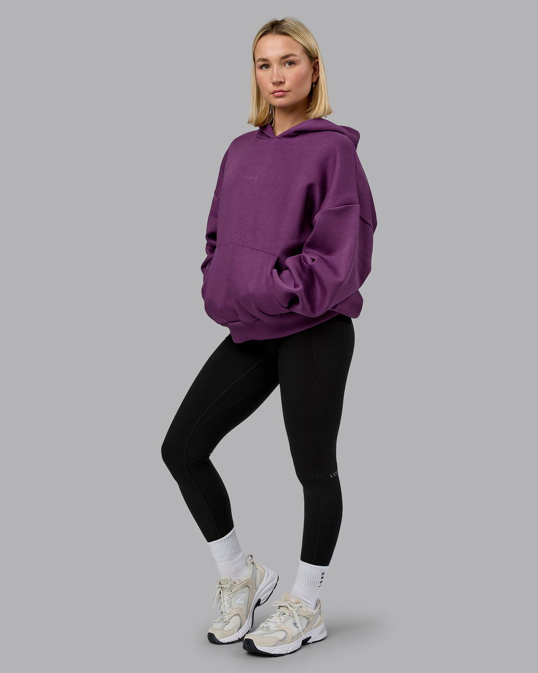 Woman wearing MVP Oversized Hoodie - Deep Purple | Model:Halle | Size:XS