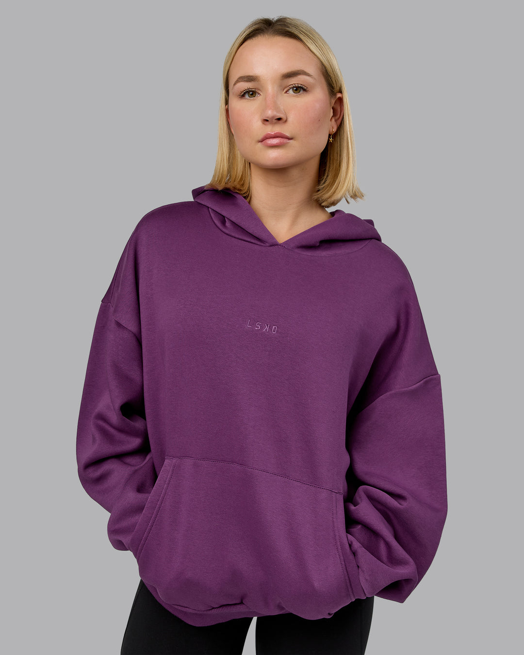 Woman wearing MVP Oversized Hoodie - Deep Purple | Model:Halle | Size:XS