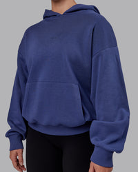 Woman wearing Unisex MVP Hoodie Oversize - Future Dusk