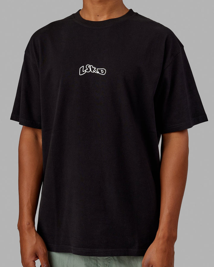 Man wearing Unisex Mad Happy Heavyweight Tee Oversize - Black