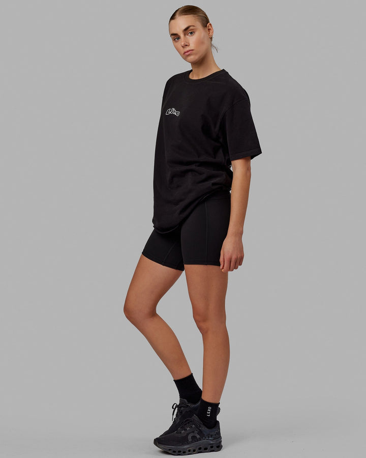 Woman wearing Unisex Mad Happy Heavyweight Tee Oversize - Black