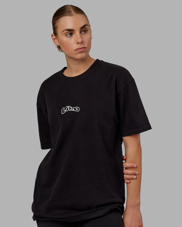 Woman wearing Unisex Mad Happy Heavyweight Tee Oversize - Black