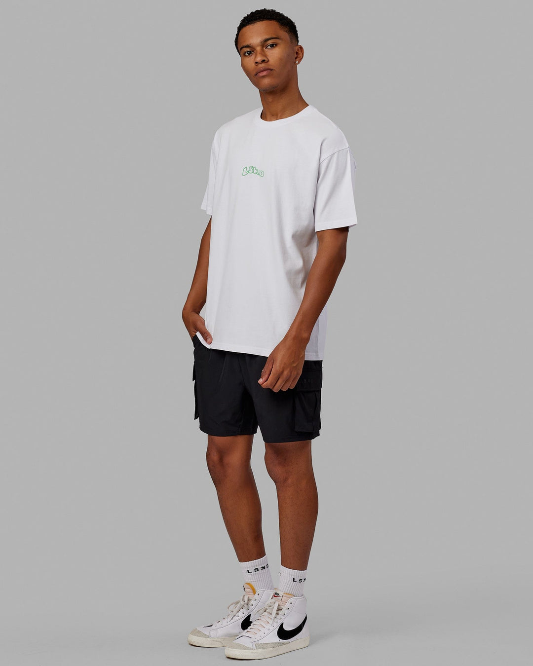 Man wearing Unisex Mad Happy Heavyweight Tee Oversize - White