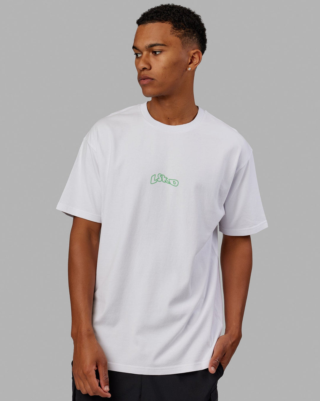 Man wearing Unisex Mad Happy Heavyweight Tee Oversize - White