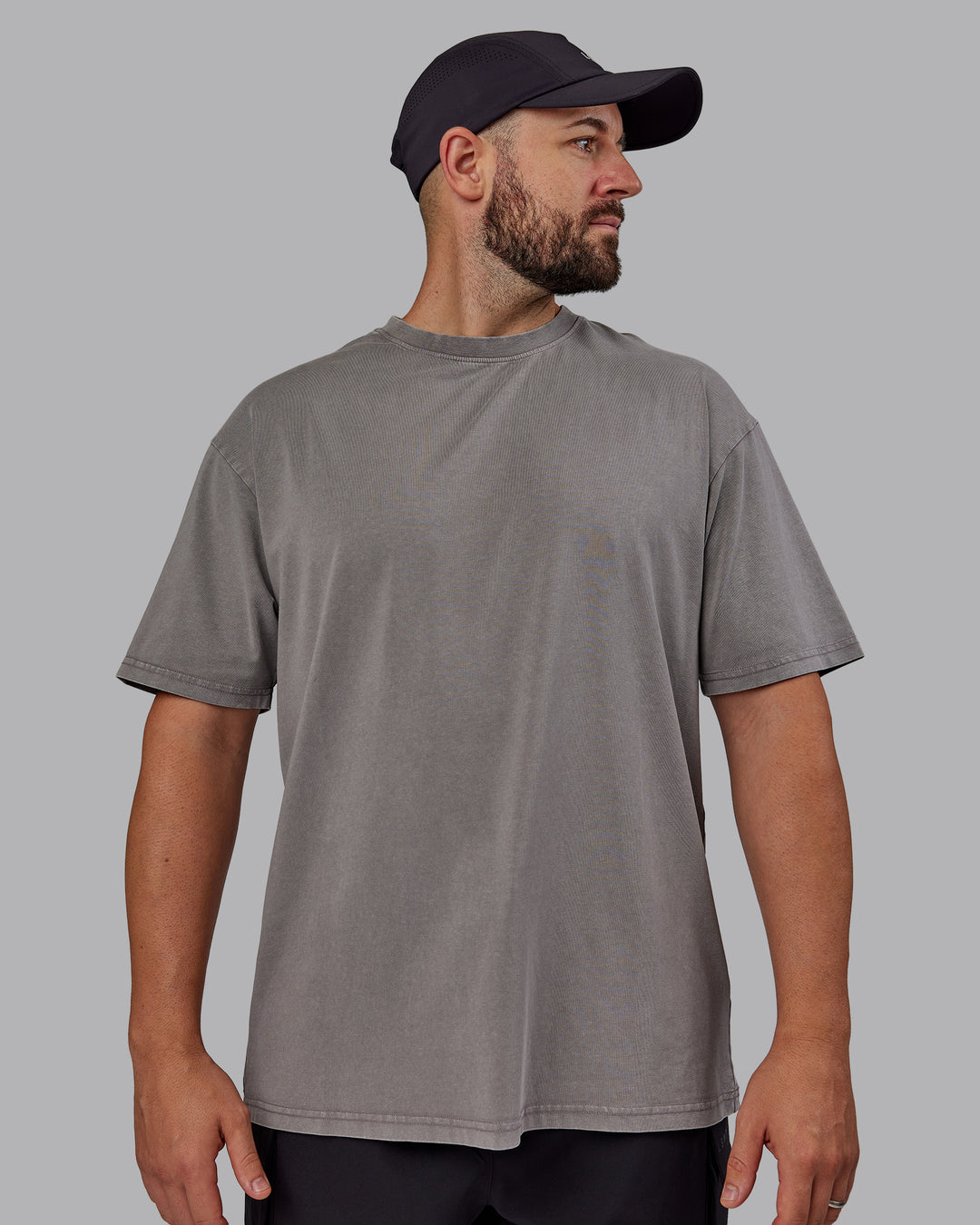 Man wearing Unisex Miami25 Washed FLXCotton Tee Oversize - Storm Front-Lemon Fizz
