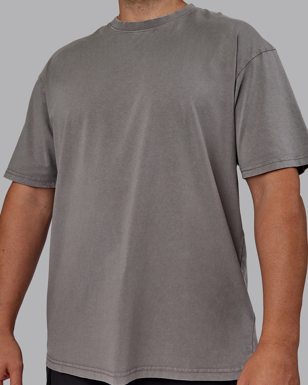 Man wearing Unisex Miami25 Washed FLXCotton Tee Oversize - Storm Front-Lemon Fizz