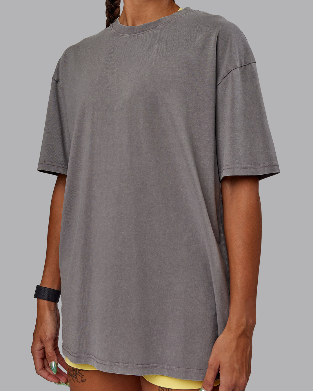 Woman wearing Unisex Miami25 Washed FLXCotton Tee Oversize - Storm Front-Lemon Fizz