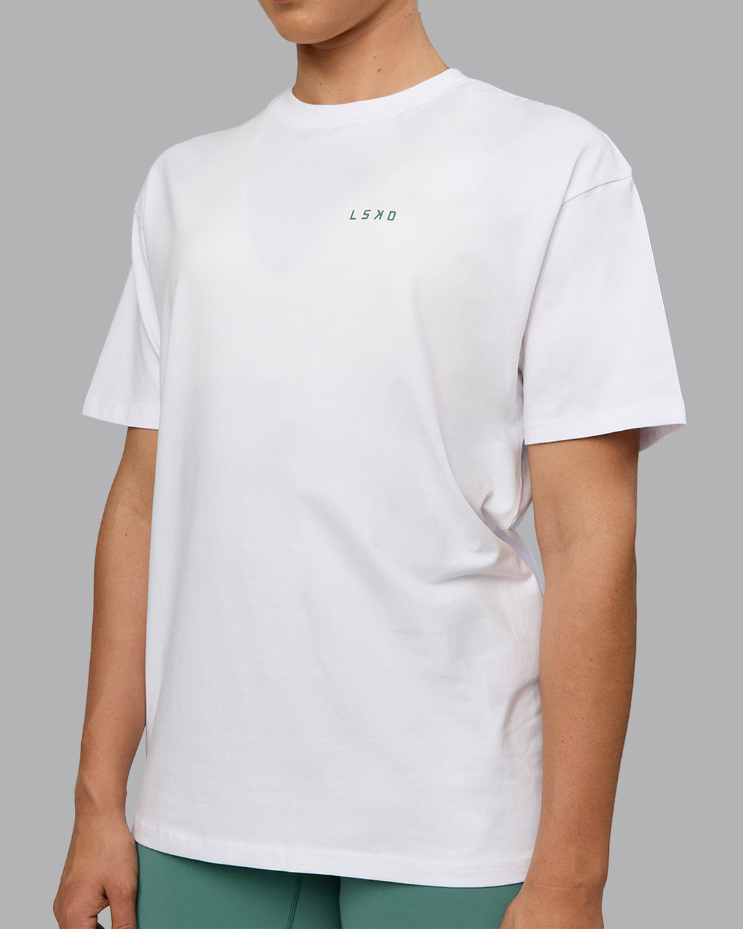 Woman wearing Unisex Move Fast Value Series FLXCotton Tee Oversize - White-Sagebrush