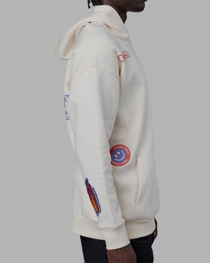 Man wearing Unisex Patchwork Hoodie Oversize - Off White