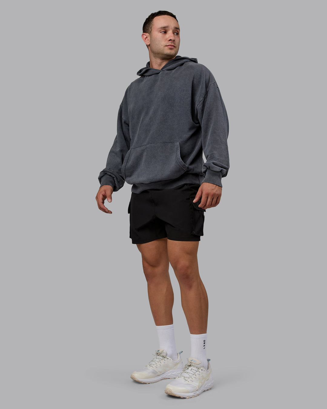 Man wearing Unisex Washed Set the Standard Hoodie Oversize - Black-Greyish Purple