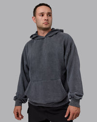 Man wearing Unisex Washed Set the Standard Hoodie Oversize - Black-Greyish Purple