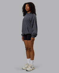 Woman wearing Unisex Washed Set the Standard Hoodie Oversize - Black-Greyish Purple
