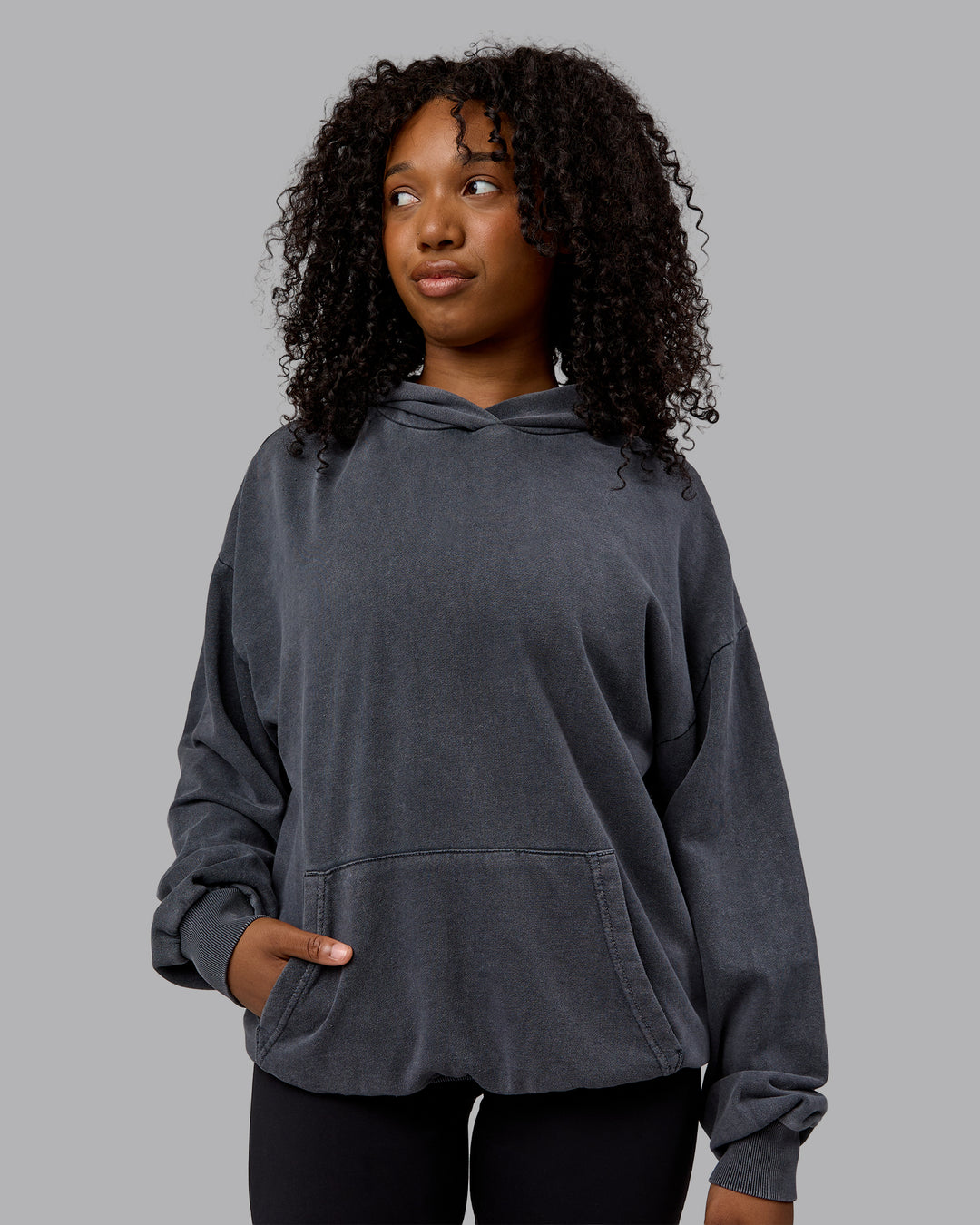 Woman wearing Unisex Washed Set the Standard Hoodie Oversize - Black-Greyish Purple