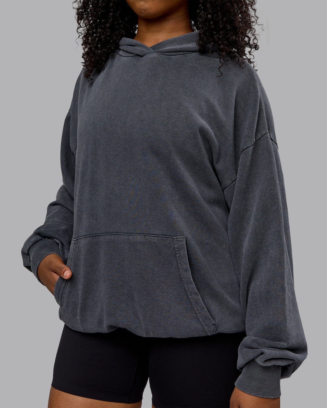 Woman wearing Unisex Washed Set the Standard Hoodie Oversize - Black-Greyish Purple