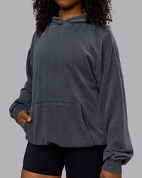 Woman wearing Unisex Washed Set the Standard Hoodie Oversize - Black-Greyish Purple